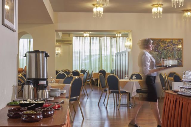 Tea and coffee station in the breakfast hall at Candia Hotel