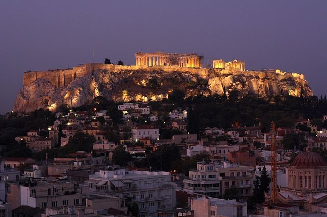 Things to see in Athens include the night views of the Acropolis from our Candia Hotel's rooftop.